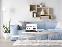 Bezel-Less MacBook Pro in Living Room Free Mockup