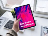 Free iPad in Hand Mockup