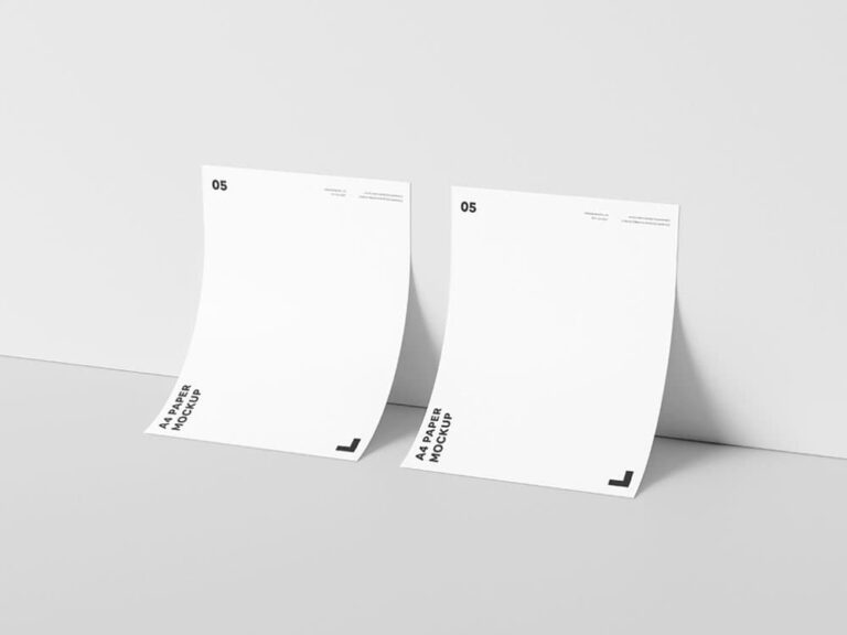 Free A4 Paper Against Wall Mockup