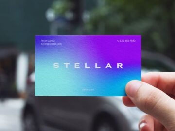 Free Business Card in Hand Mockup