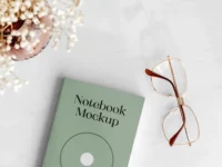 Free Notebook with Glasses Mockup