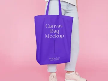 Free Person With Canvas Bag PSD Mockup